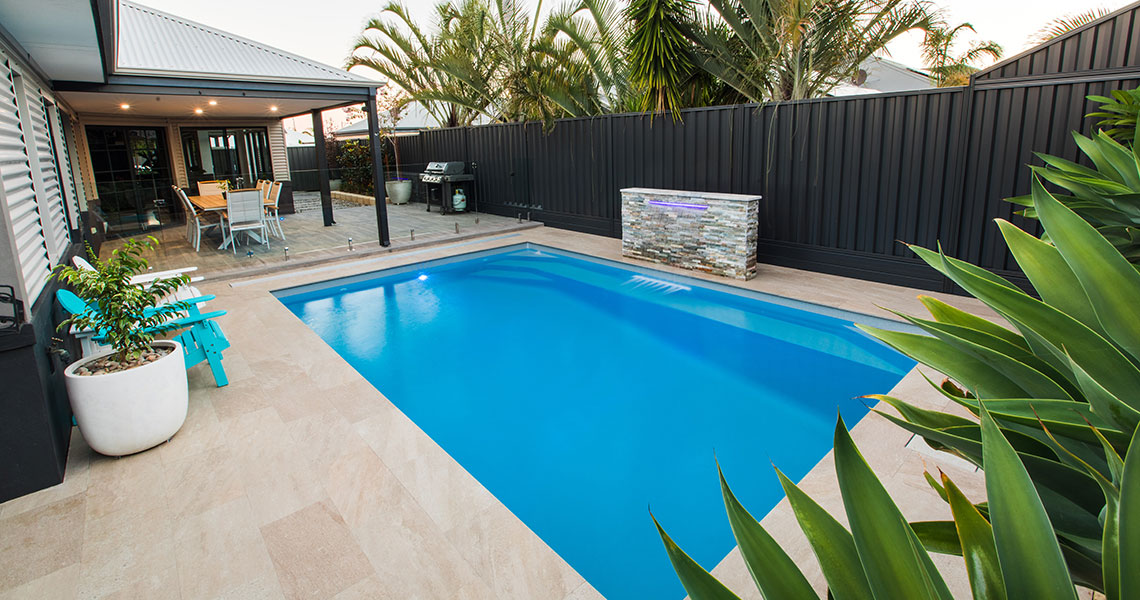 Heirloom Pools fiberglass pool construction and outdoor living project